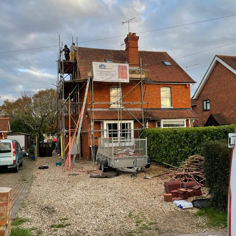 Ladder up red roof