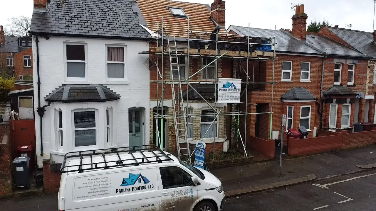 van in front of house